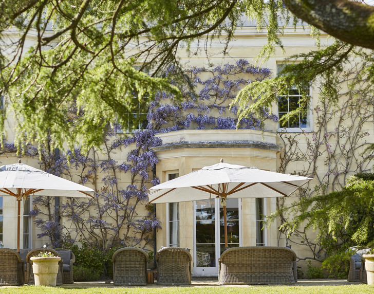 Outside Lime Wood hotel in the garden